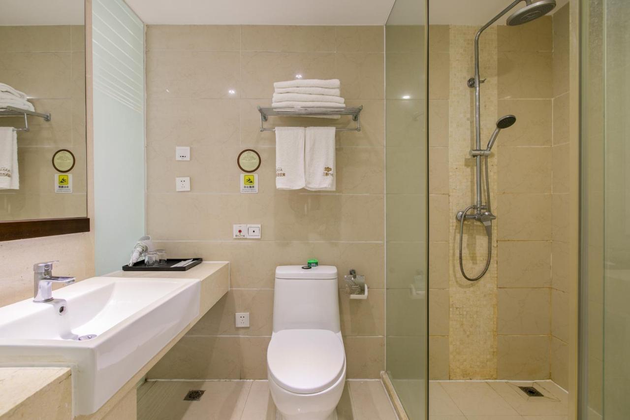 Aparthotel Sanya Sun And Sea Gueshouse Extérieur photo
