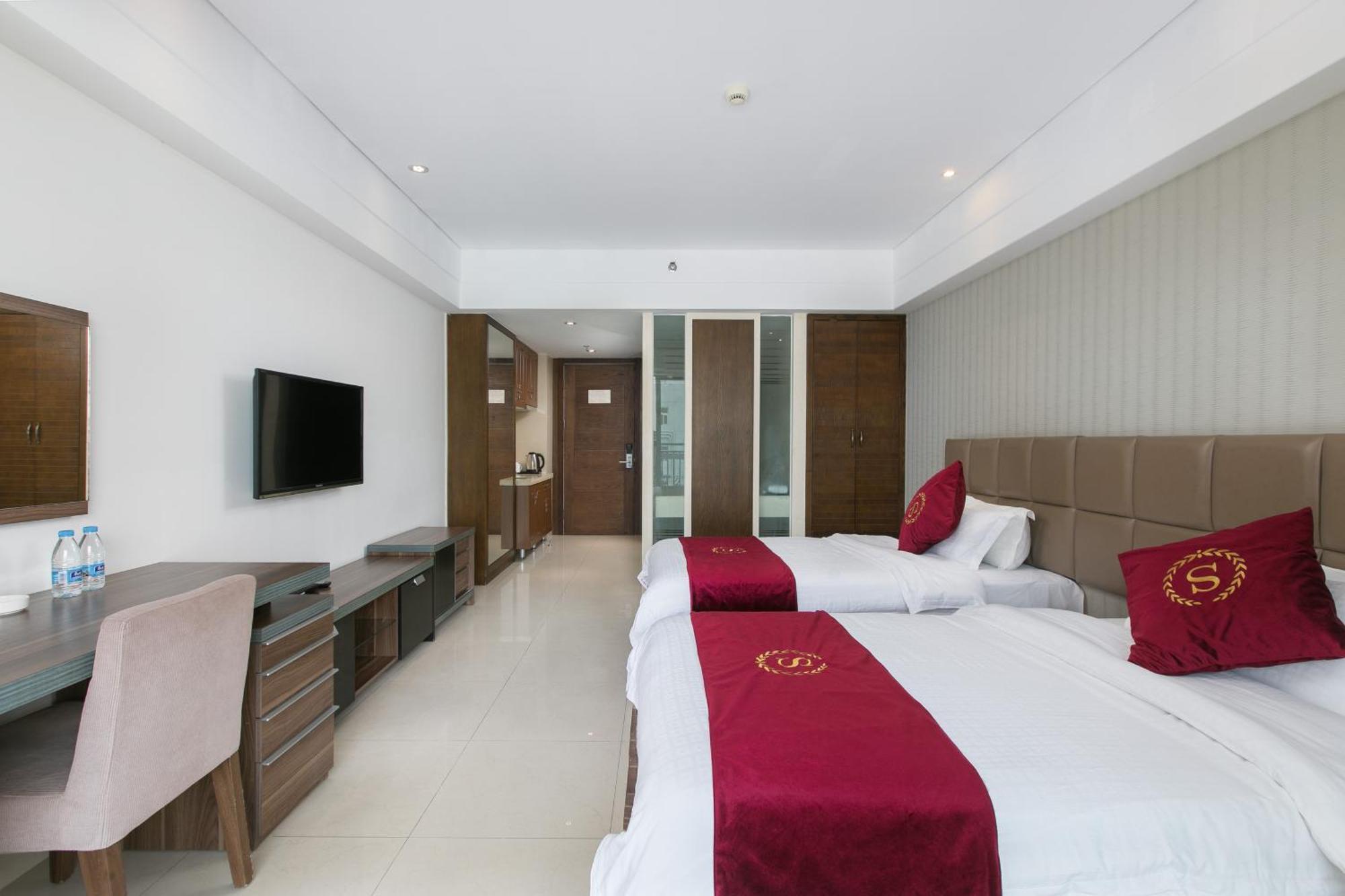 Aparthotel Sanya Sun And Sea Gueshouse Chambre photo
