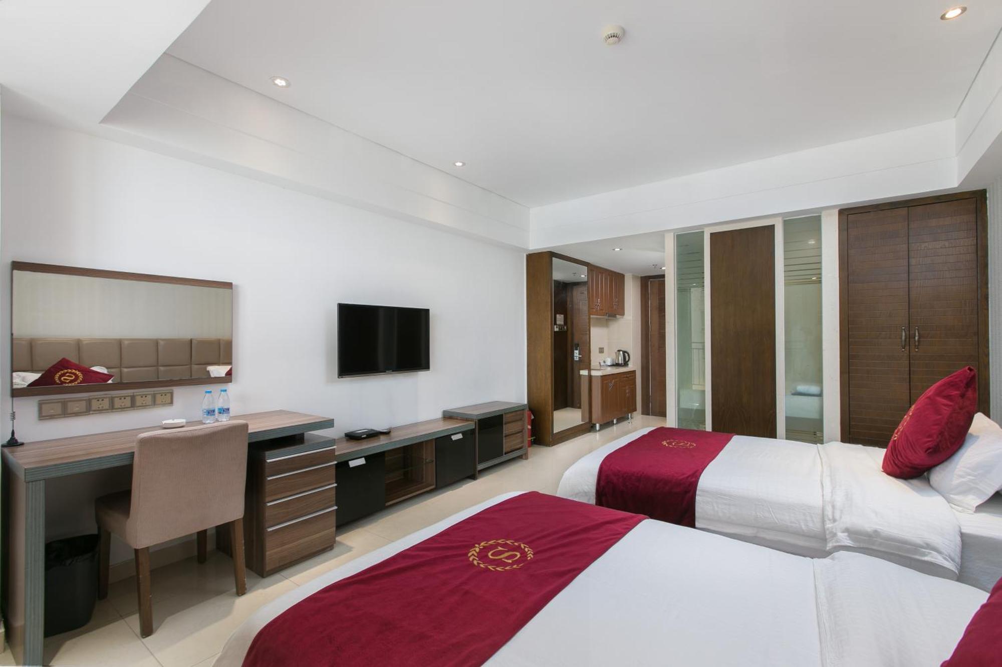 Aparthotel Sanya Sun And Sea Gueshouse Chambre photo