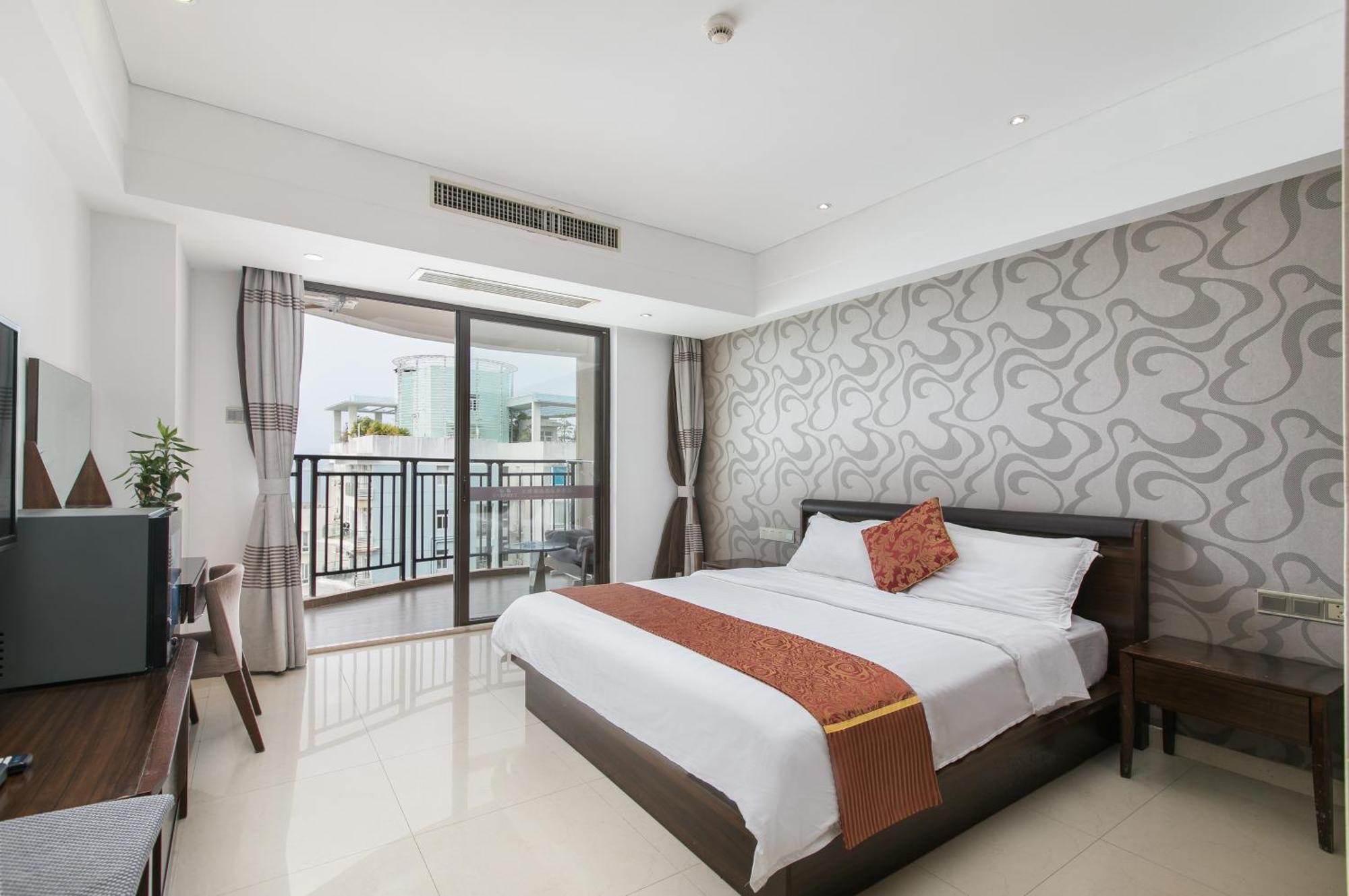 Aparthotel Sanya Sun And Sea Gueshouse Chambre photo