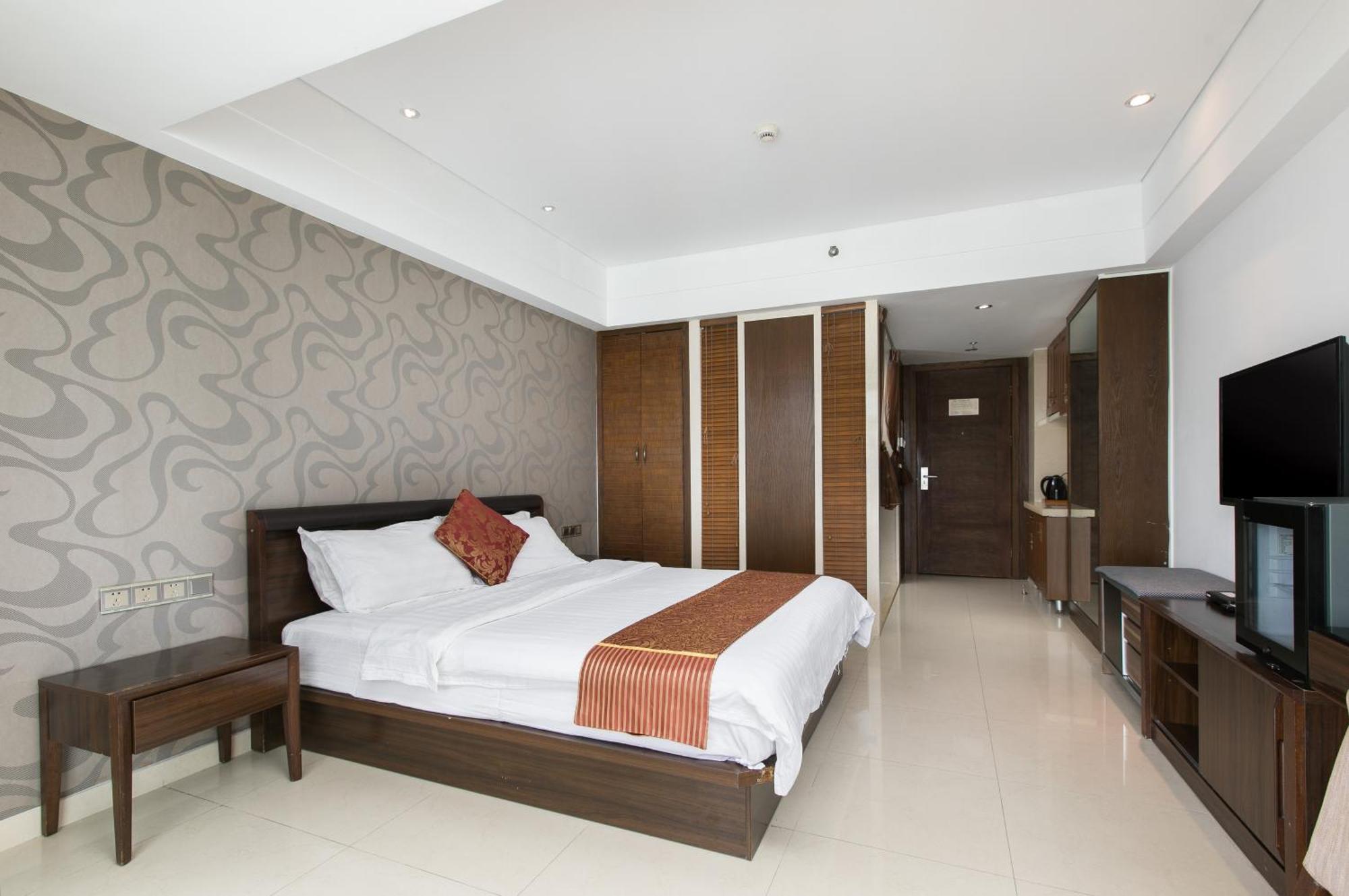 Aparthotel Sanya Sun And Sea Gueshouse Chambre photo