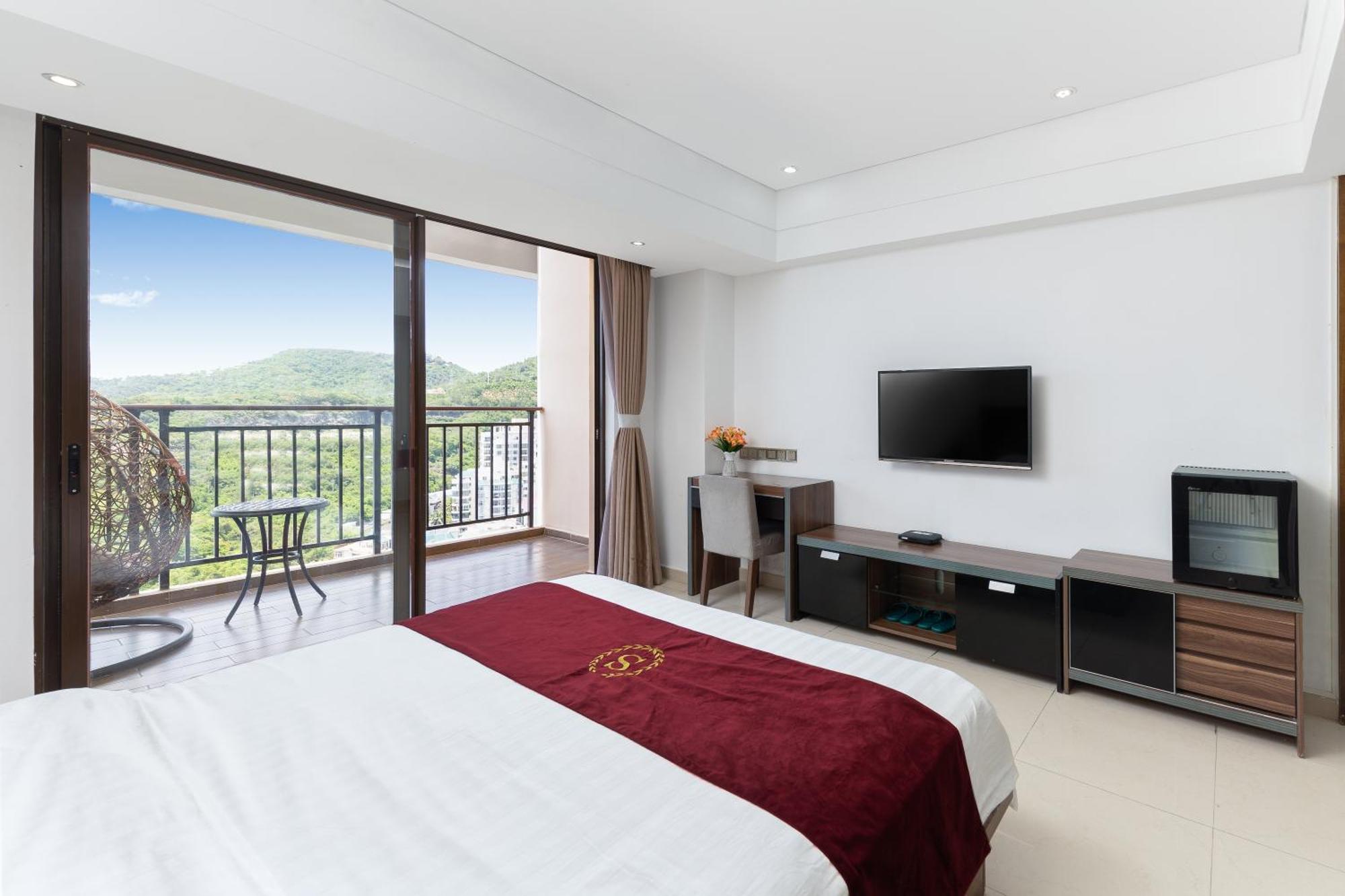 Aparthotel Sanya Sun And Sea Gueshouse Extérieur photo