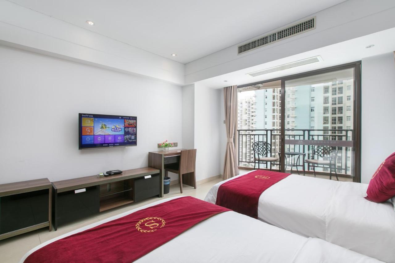 Aparthotel Sanya Sun And Sea Gueshouse Extérieur photo