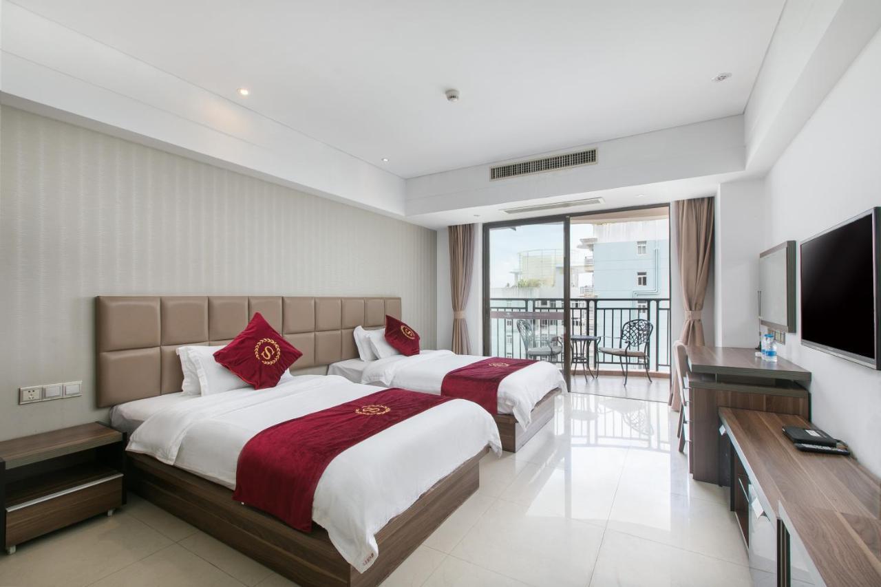 Aparthotel Sanya Sun And Sea Gueshouse Extérieur photo