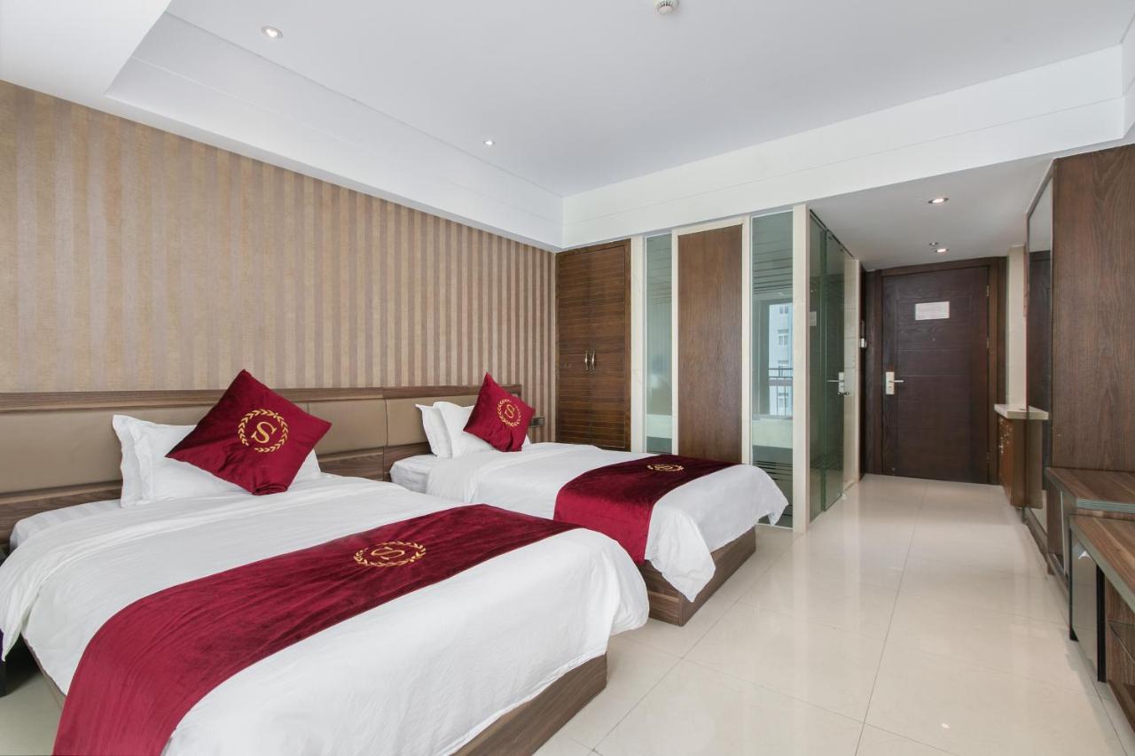 Aparthotel Sanya Sun And Sea Gueshouse Extérieur photo