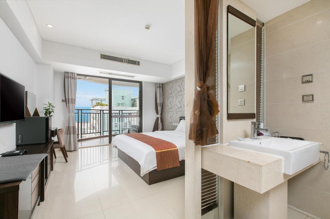 Aparthotel Sanya Sun And Sea Gueshouse Chambre photo